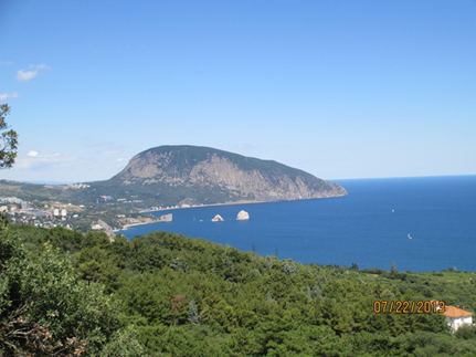 Ayu-Dag ("Bear Mountain" stretches out from the beach in Crimea into the Black Sea.