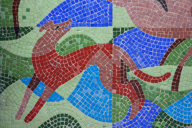 A close-up of mosaic tiles depicting a horse, image via Soviet Artefacts at Unsplash